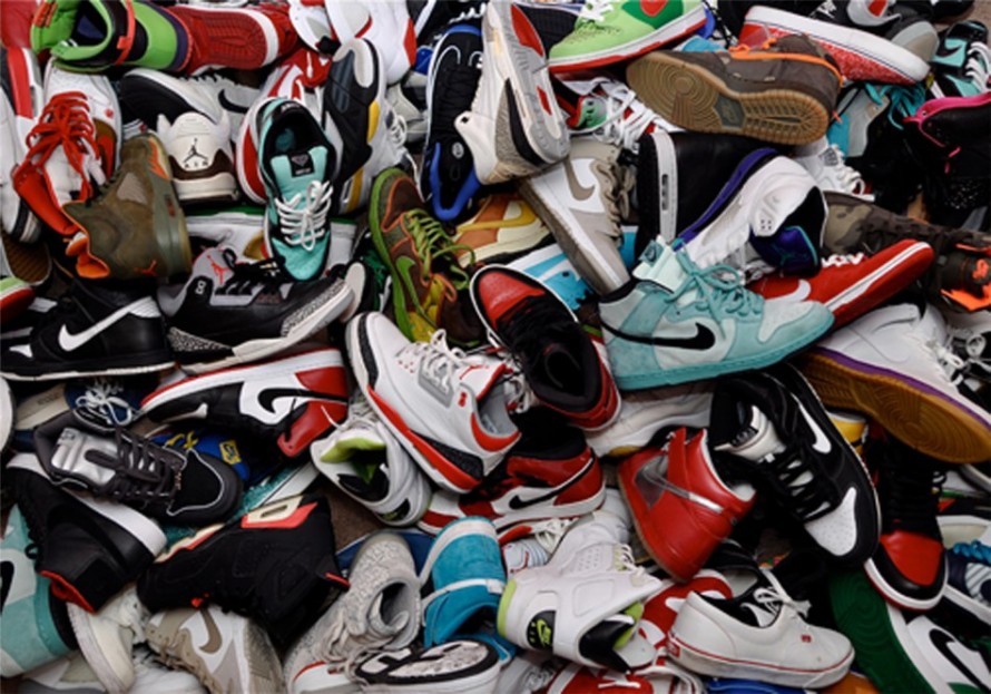 pile of athletic shoes